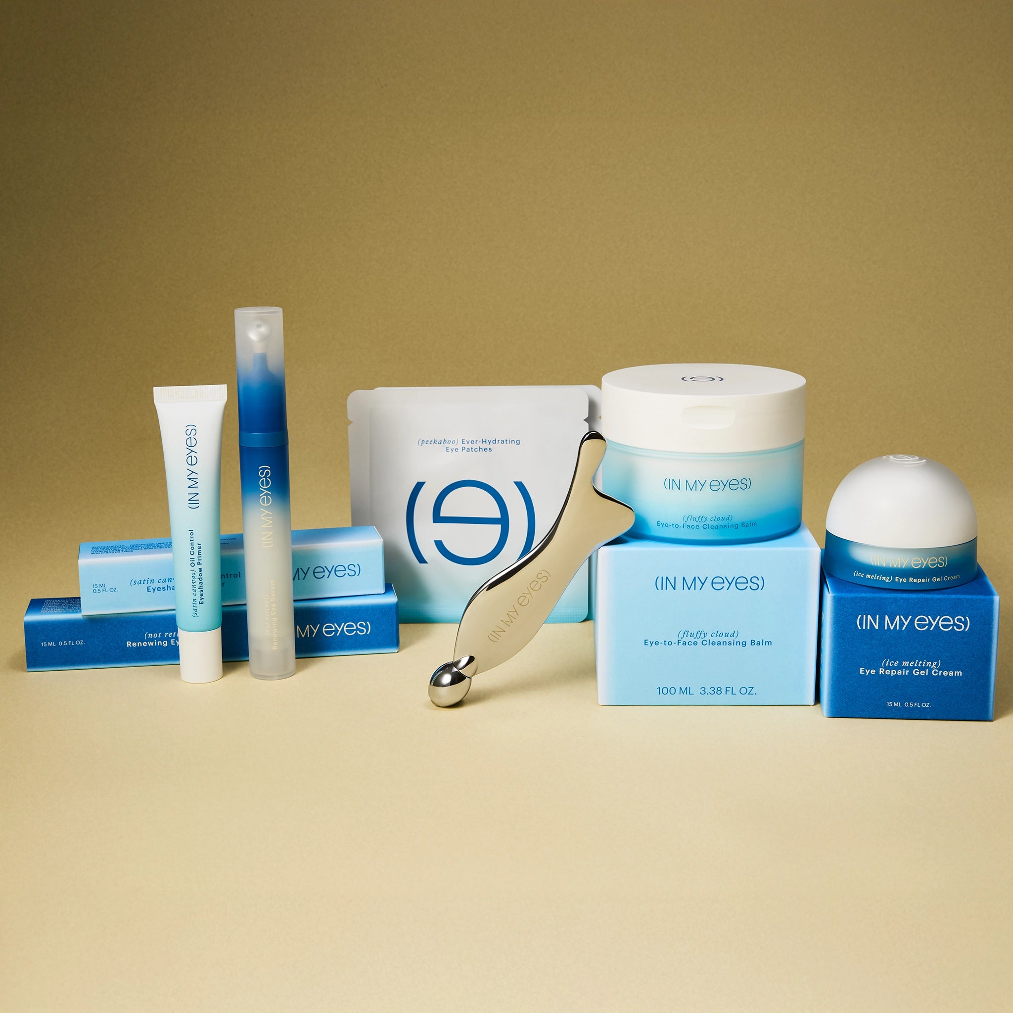 Collection of skincare products with 'In My Eyes' branding on a beige background